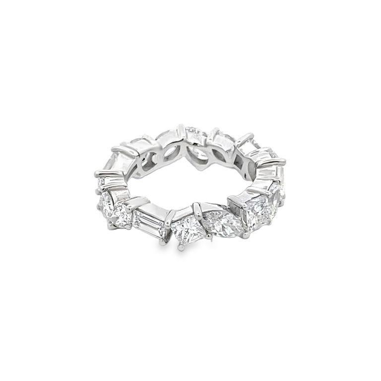 We are thrilled to introduce to you our latest diamond fancy-shape eternity band. This band is unique because of the perfect balance between its different diamond shapes. It has sixteen stones in F-G grade color and a clarity grade of SI-VS with a