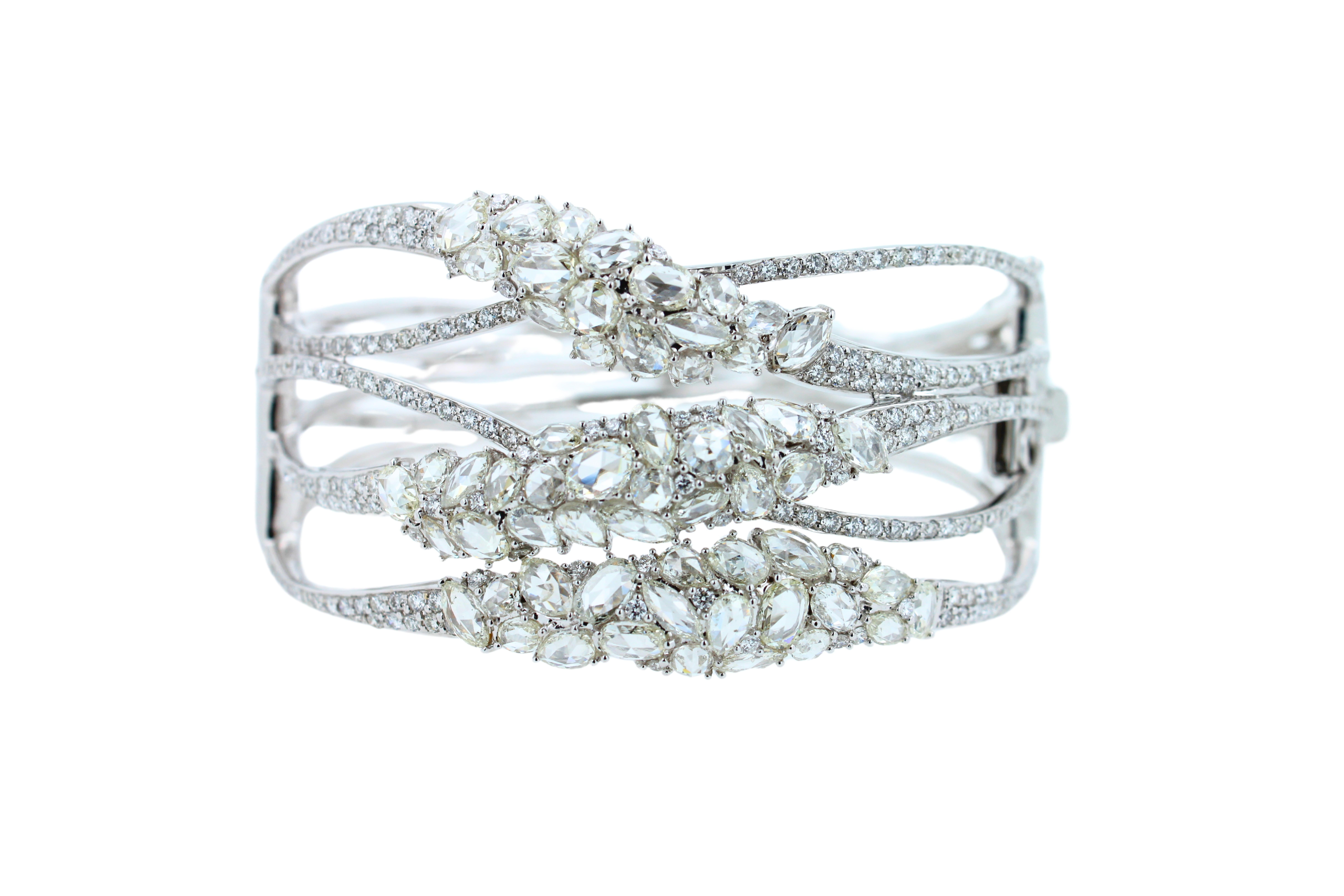 Diamond Bangle
14 CTW Diamonds G/VS Quality Grades +
18K White Gold
Fancy Shapes with Rose-Cut Facets 
Beautiful Work, Structure, Finish, Make
Will Fit Most Small to Larger Medium Size Wrists