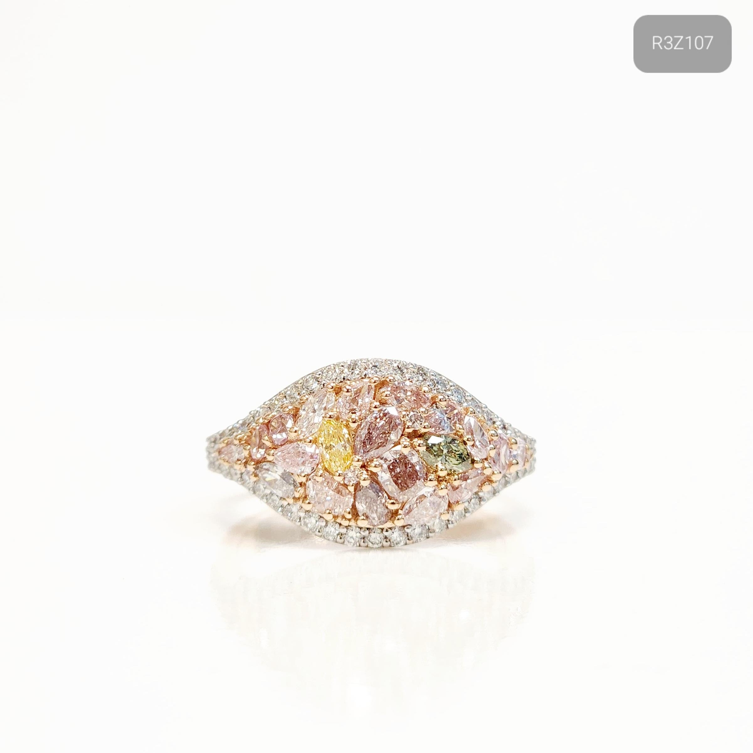 Adorn your finger with the exquisite beauty of the Fancy Shaped Mix Diamond Ring. This captivating piece features a stunning array of 1.19 carats mixed shaped fancy colored diamonds in mesmerizing shades of pink, yellow, and green diamonds which are
