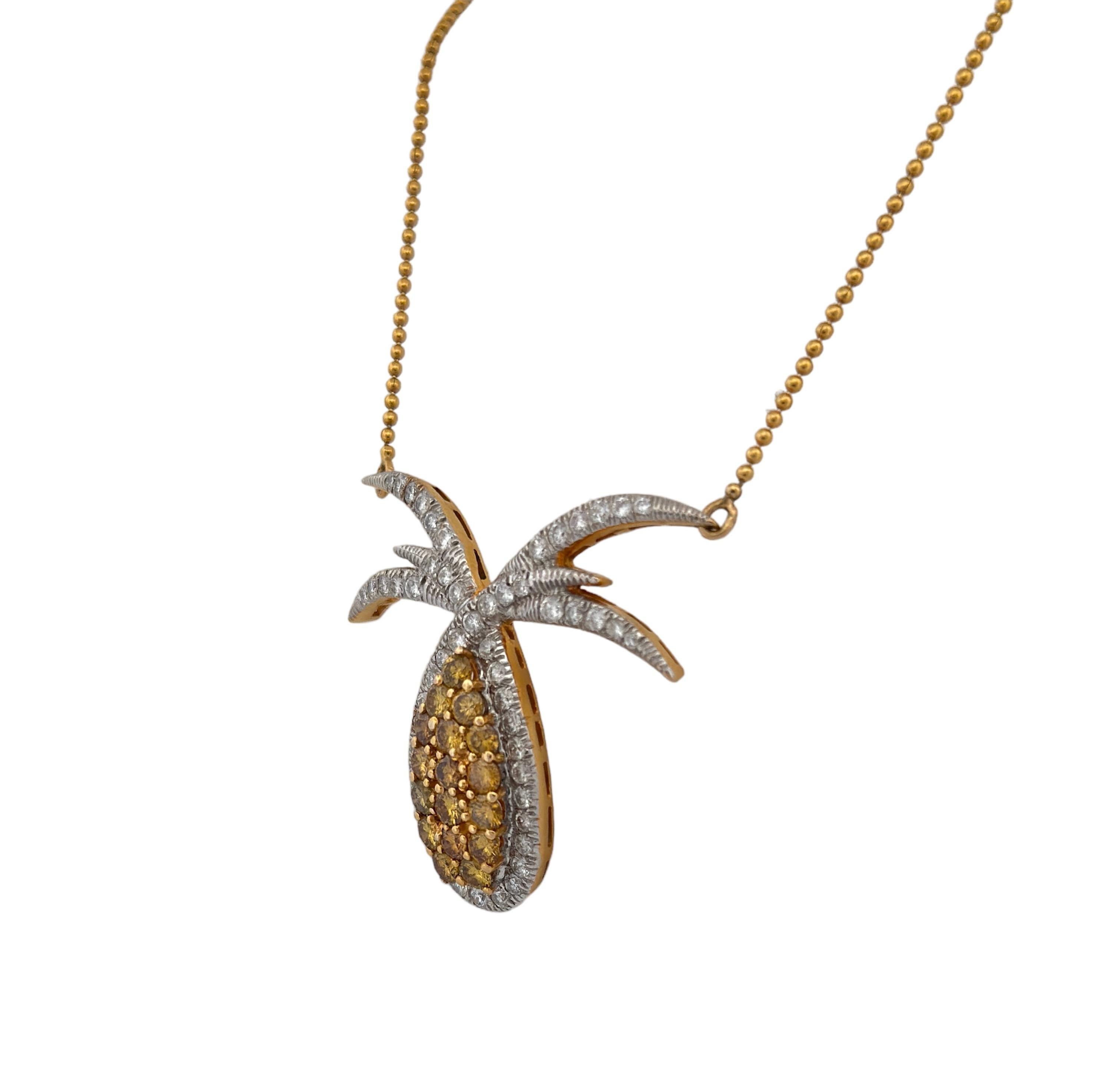 This pendant necklace, a true relic from the early 20th century, is a dazzling embodiment of vintage charm and elegance. Skillfully crafted from the warmth of 18k yellow gold, it features a stunning center With Yellow Diamonds the jewel at the heart