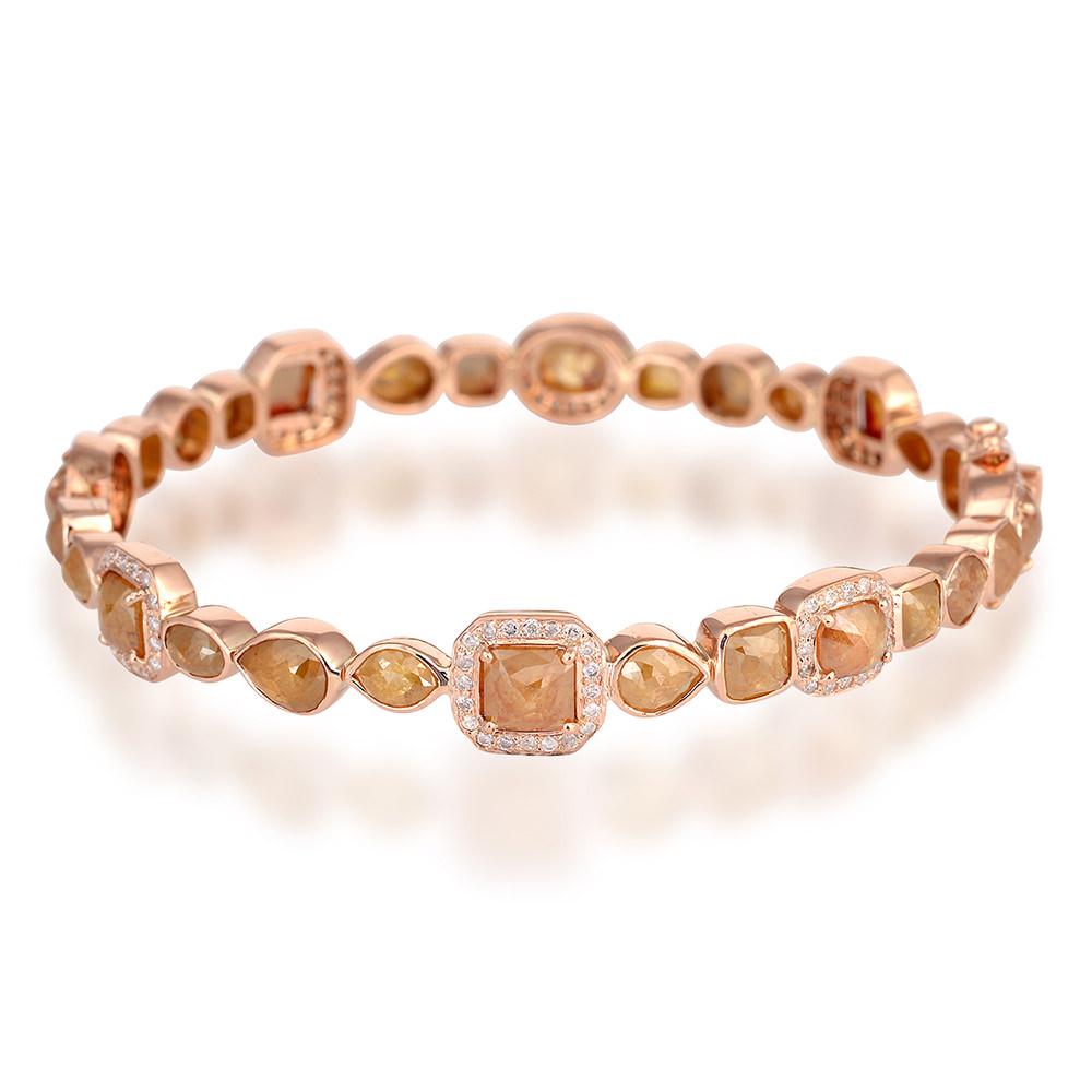 A stunning tennis bracelet handmade in 18K gold. It is set in 13.08 carats fancy slice diamonds.

FOLLOW  MEGHNA JEWELS storefront to view the latest collection & exclusive pieces.  Meghna Jewels is proudly rated as a Top Seller on 1stdibs with 5