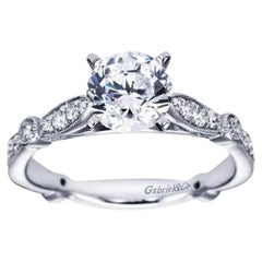 Bague de fiançailles solitaire fantaisie en or blanc et diamants