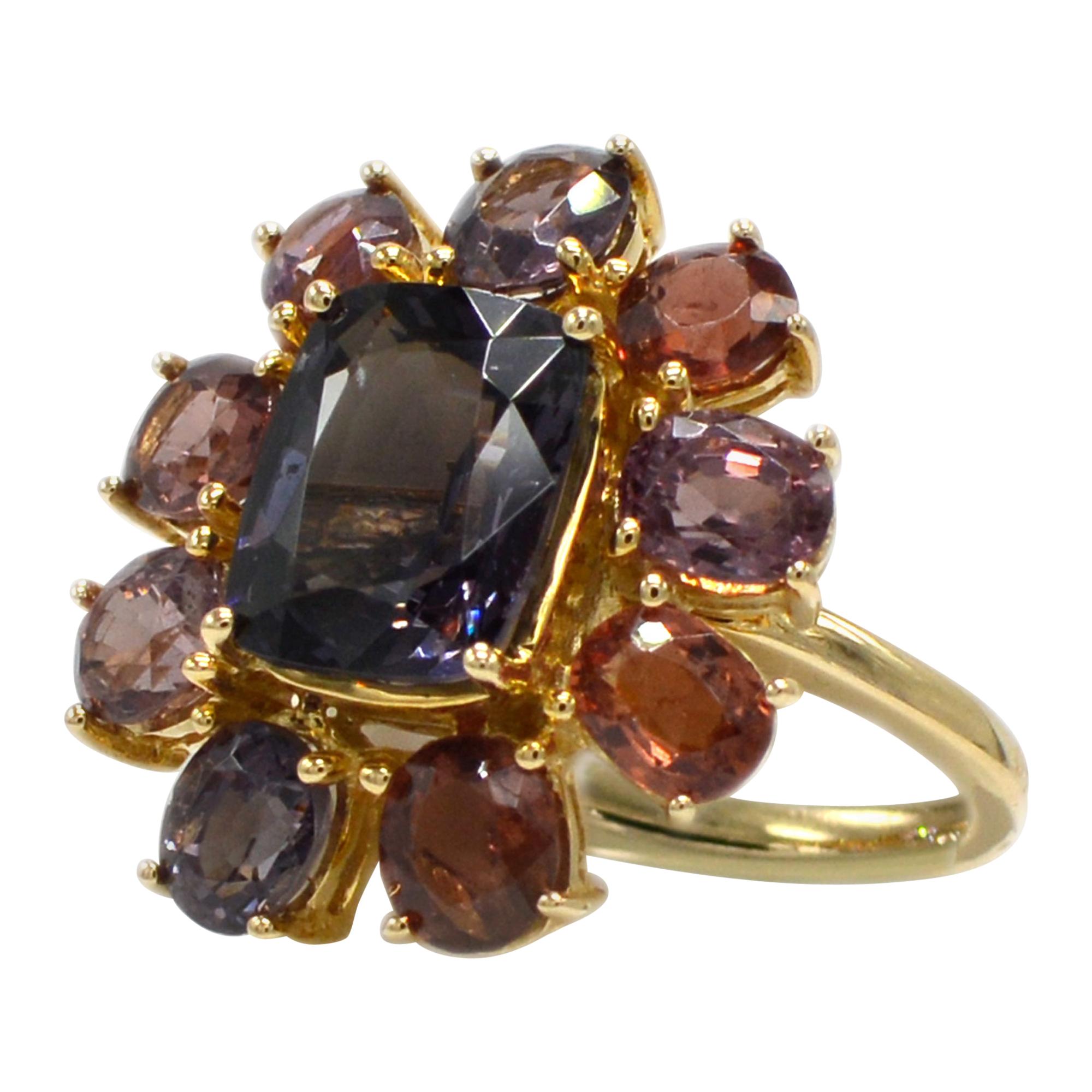 Unique mix color of Spinel Gemstones
Center- Gray Spinel - modified cushion shape 4.30 carat,  Side surrounding multicolor Spinals are 5.55 Carat.
14k Rose Gold  6.0 grams, 
Finger size 7
all stones are natural - and none heated or treated.

Spinel