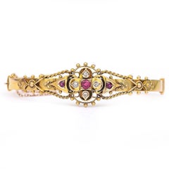 Fancy Victorian 15 Karat Yellow Gold ‘Puginesque’ Ruby and Diamond Bangle
