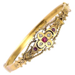 Fancy Victorian 15 Karat Yellow Gold ‘Puginesque’ Ruby and Diamond Bangle