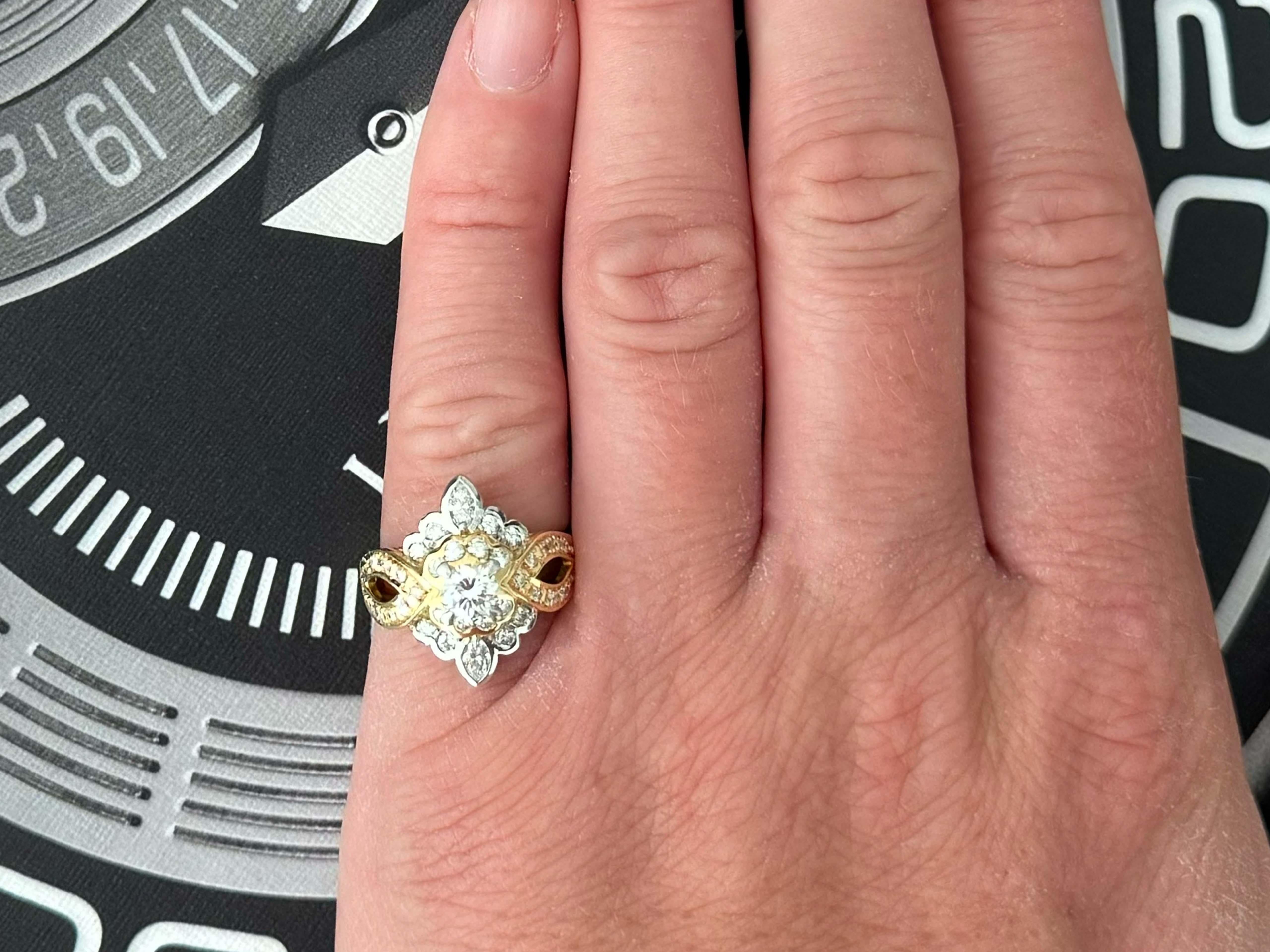 Specifications:

Metal: 18K Yellow Gold and Platinum

Diamond Count: 37

Center Diamond Color: H-I

Center Diamond Clarity: VS2-SI1

Center Diamond Carat Weight: 0.38 carats
​
​Additional Diamond Color: G-I

Additional Diamond Clarity: