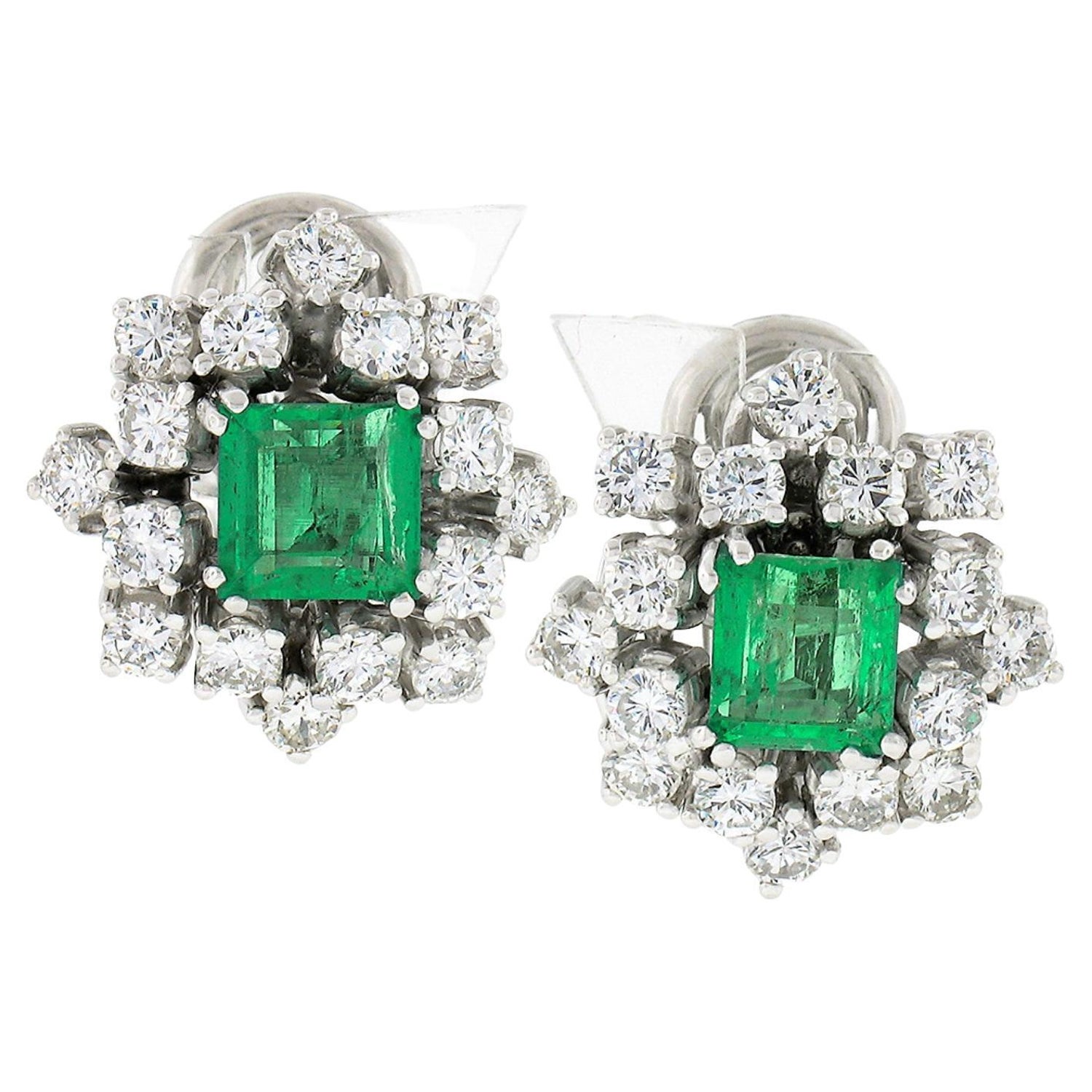 Fancy Vintage Platinum 4.10ctw Square Emerald w/ Round Diamond Cluster  Earrings at 1stDibs