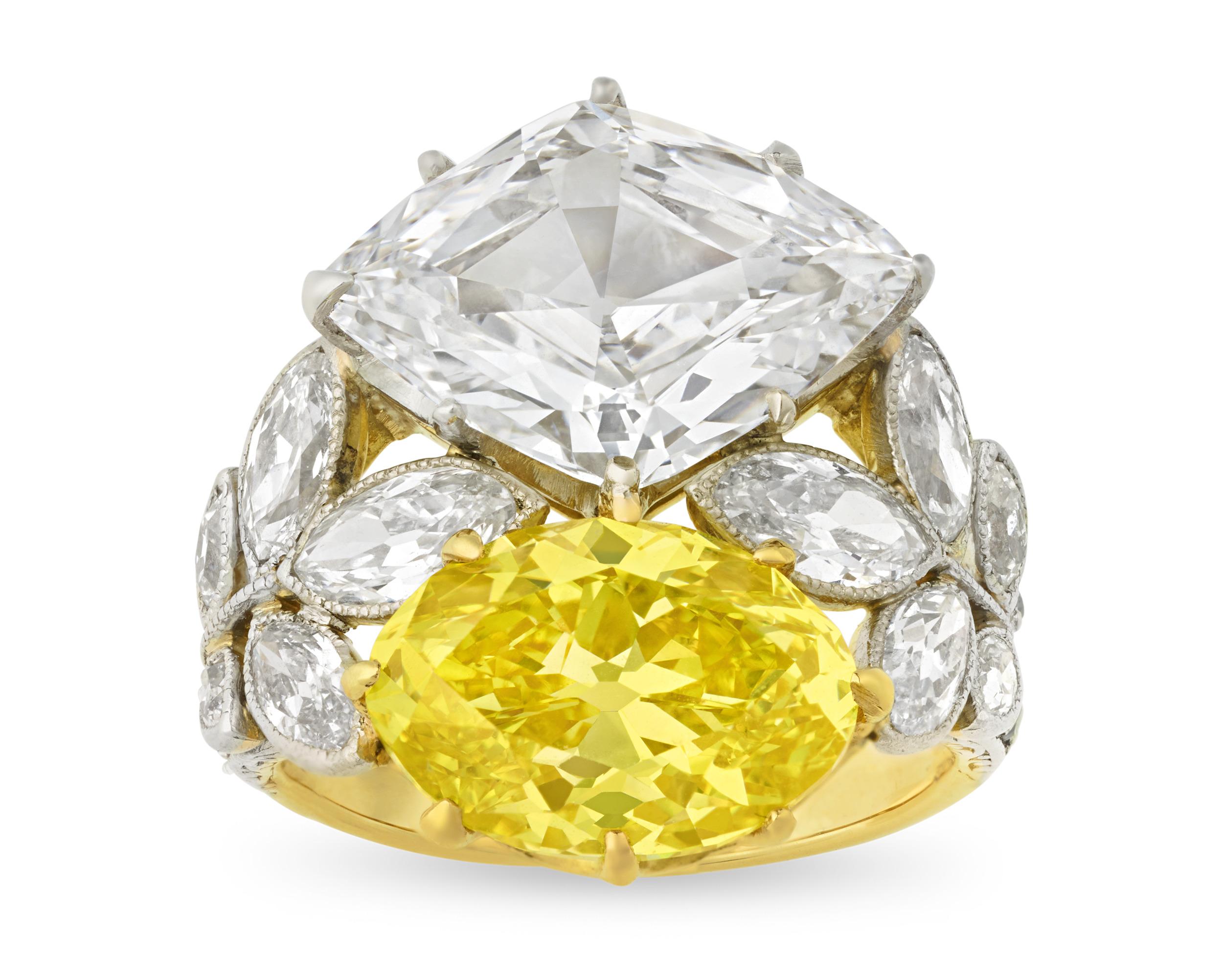 A breathtaking combination of two of the world’s finest diamonds and beautiful Belle Époque artistry, this ring displays both a stunning vivid yellow diamond and an extraordinary Golconda-type white diamond. Finding diamonds of this quality set into