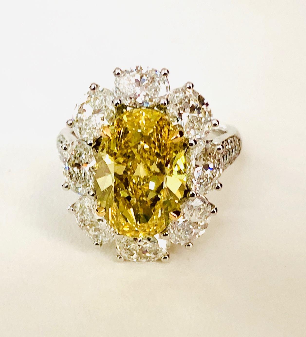 Contemporary Fancy Vivid Yellow/GIA Report Diamond 4.43 CT,  Platinum/YG  Ring For Sale