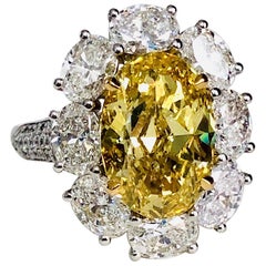 Fancy Vivid Yellow/GIA Report Diamond 4.43 CT,  Platinum/YG  Ring