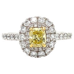 Fancy vivid yellow diamond double halo engagement ring platinum