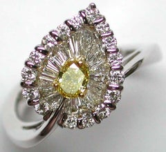 Fancy Vivid Yellow Diamond Engagement Ring