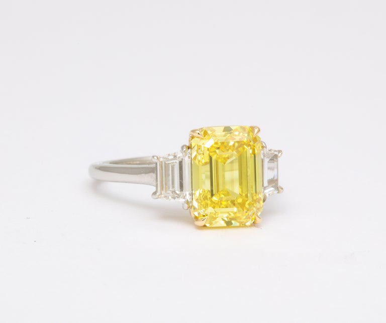 Women's or Men's Fancy Vivid Yellow Emerald Cut Ring For Sale