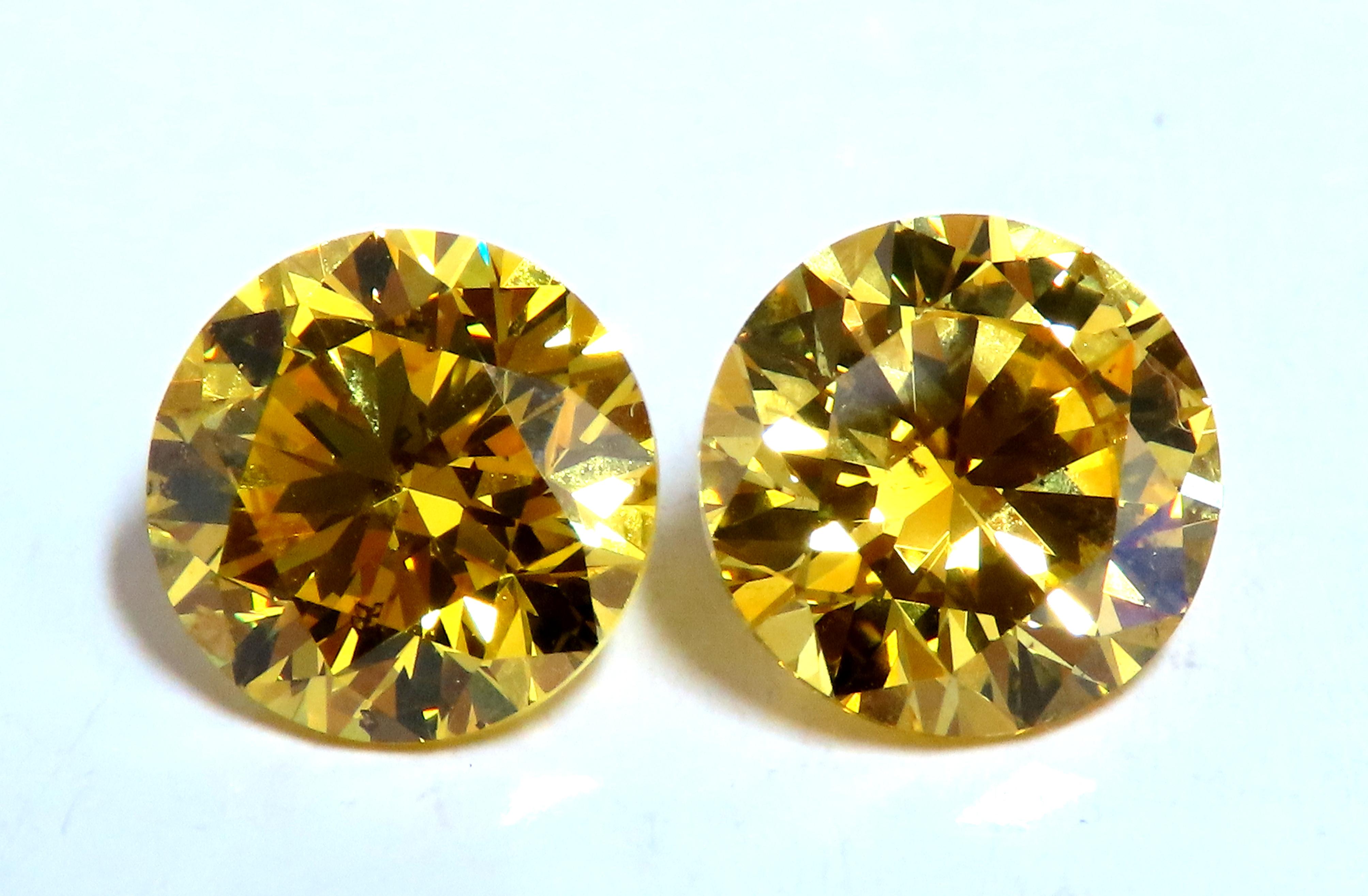 2.05ct & 2.01ct Natural GIA Certified Fancy Vivid Yellow diamonds. 
Matching pair for Studs.
The only ones available on market- rare.
Si-1 clarity. 
Buyer welcome to choose 18kt or platinum mounting.
We also have design services -in house.
Avis