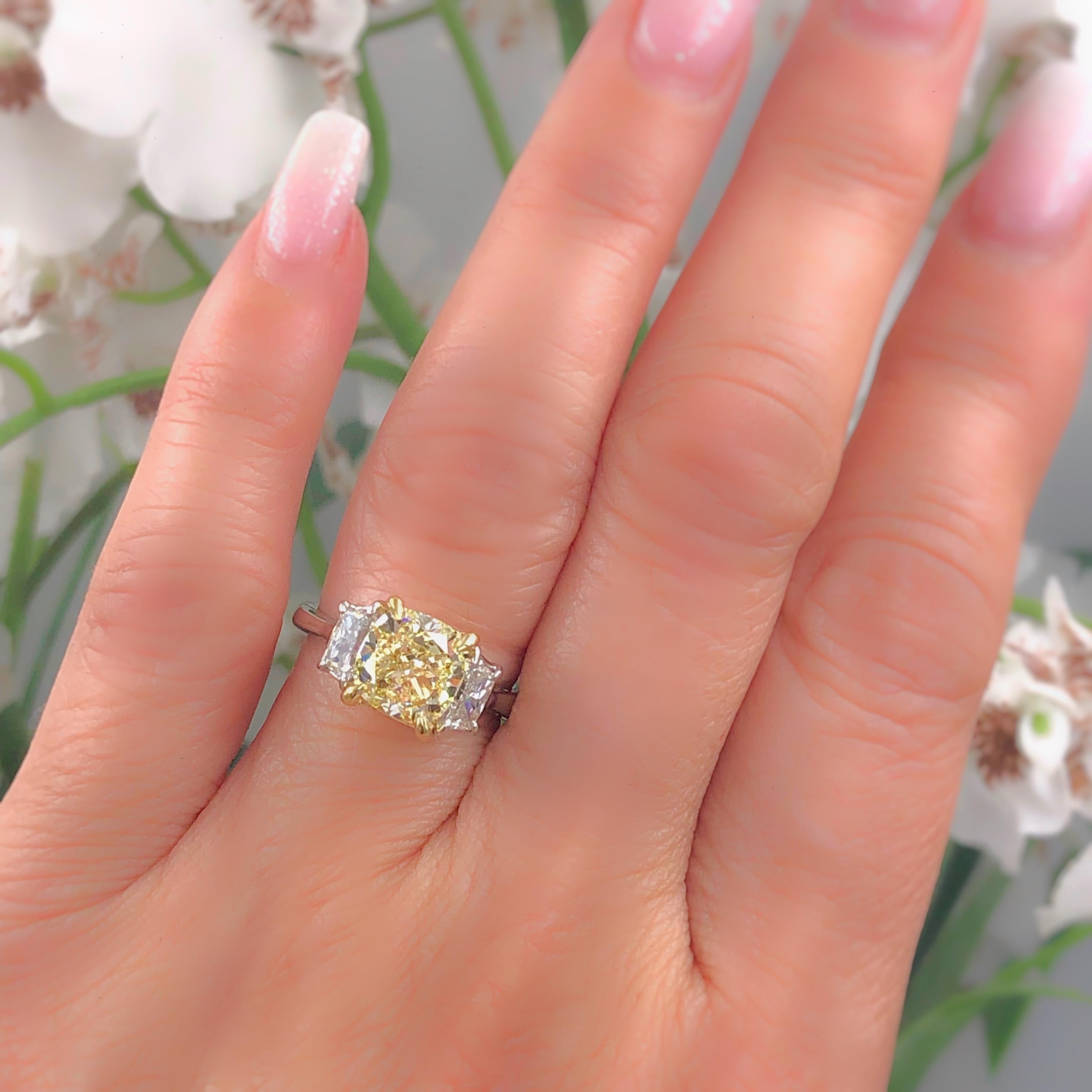 FANCY YELLOW CUSHION DIAMOND THREE-STONE ENGAGEMENT RING

Style:  3-Stone
Serial Number:  GIA#5151807803
Metal:  Platinum with 18k Yellow Gold Prongs and Basket
Size:  6 - sizable
Total Carat Weight:  2.75 tcw
Diamond Shape:  Cushion Modified