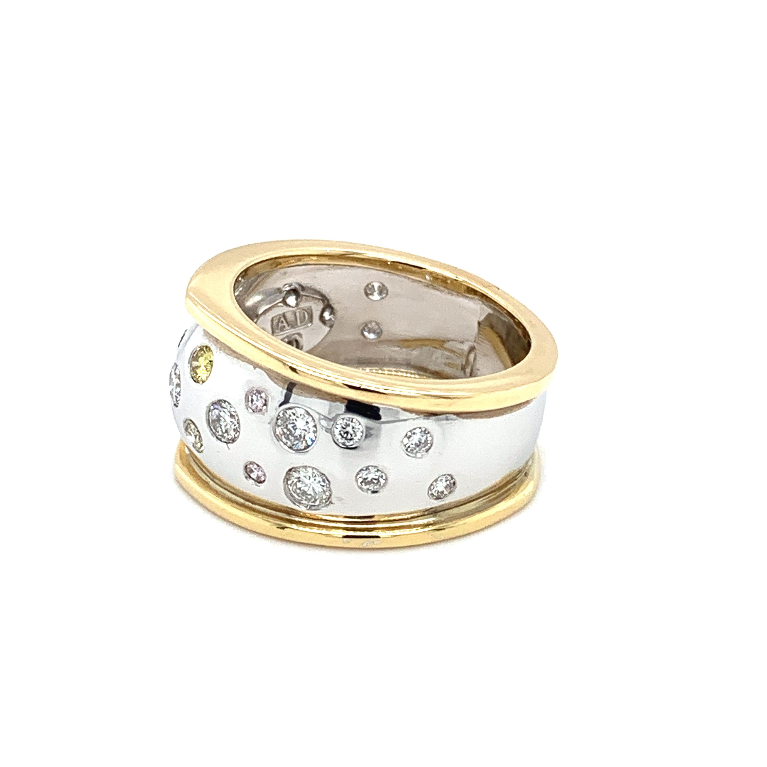 Art deco cocktail ring with mix diamonds in 18k white and yellow gold.
Composed of fancy yellow, pink, champagne, brown and white diamonds all mounted in 18k yellow and white gold large cocktail ring.
The ring hallmarked.
All diamond various sizes