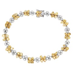 Tennisarmbänder aus Gold