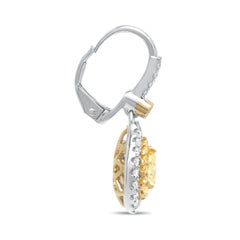 Fancy Yellow and White Diamond Lever Back Earrings Set in 18 Karat Gold