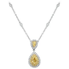 Fancy Yellow and White Diamond Pear Shaped Pendant Set in 18 Karat Gold