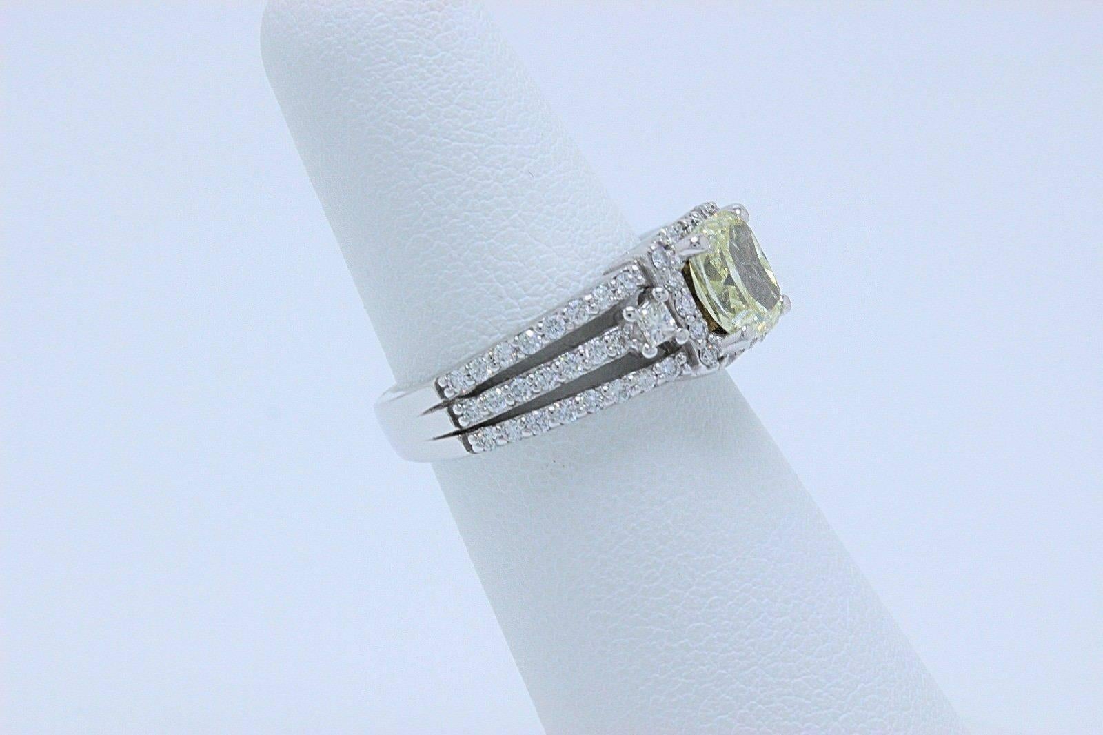 Fancy Yellow Cushion Cut 1.96 Carat Diamond Ring in 14 Karat White Gold GIA For Sale 5