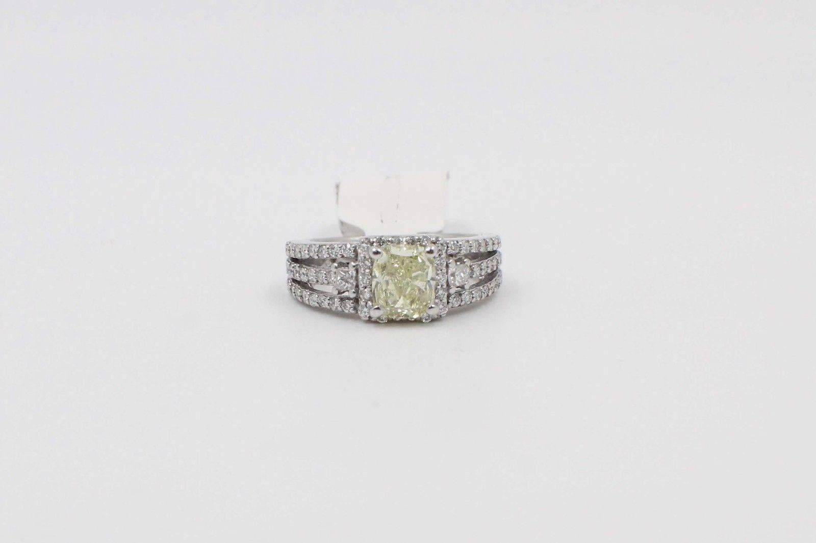 Fancy Yellow Cushion Cut 1.96 Carat Diamond Ring in 14 Karat White Gold GIA In Excellent Condition For Sale In San Diego, CA