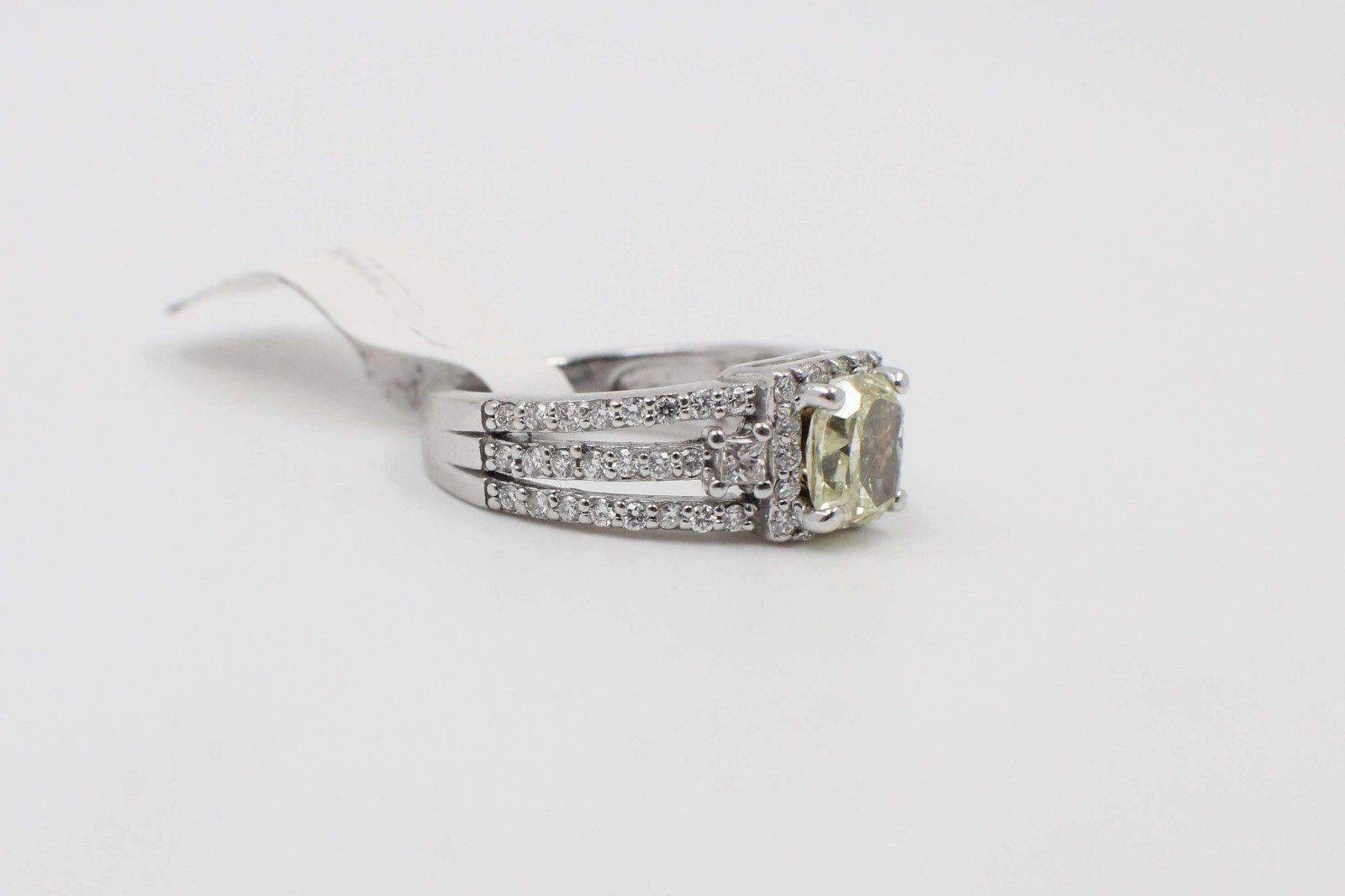 Women's Fancy Yellow Cushion Cut 1.96 Carat Diamond Ring in 14 Karat White Gold GIA For Sale