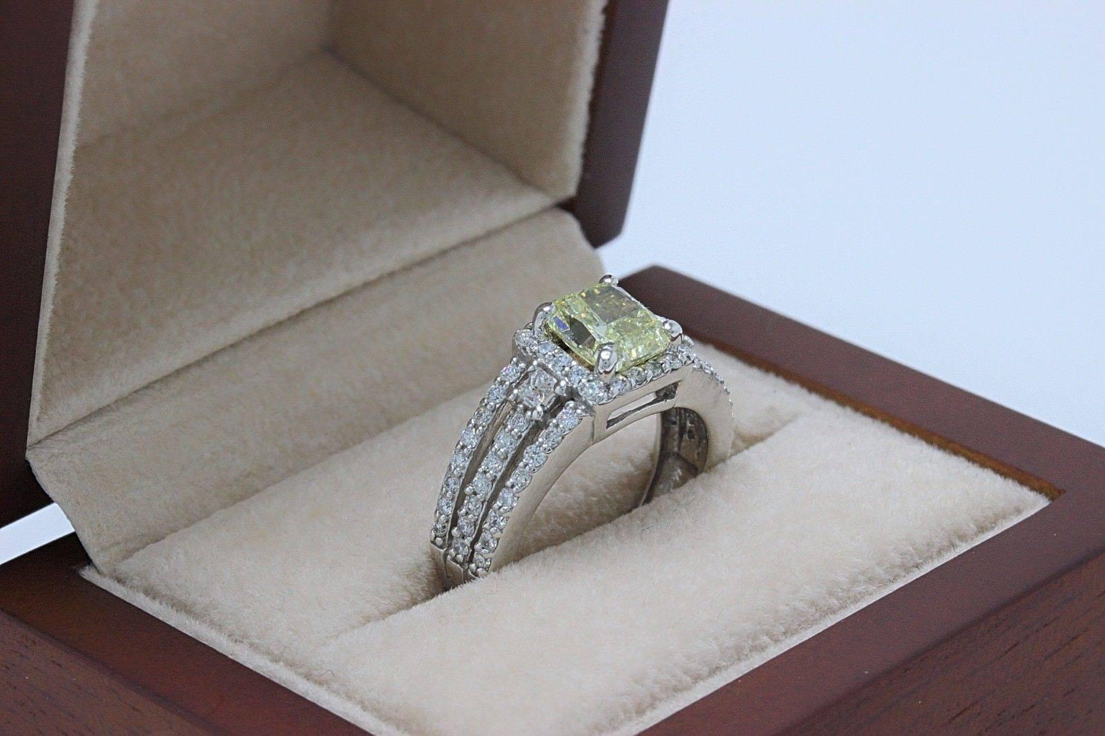 Fancy Yellow Cushion Cut 1.96 Carat Diamond Ring in 14 Karat White Gold GIA For Sale 1
