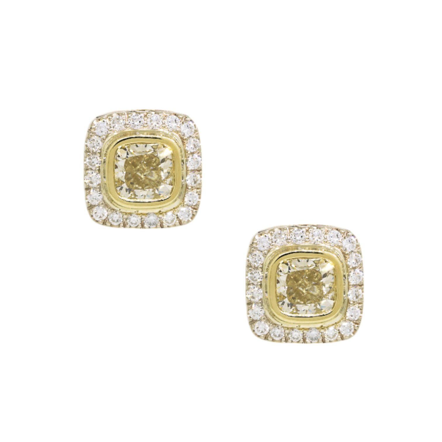 Natural Fancy Yellow Cushion Cut Diamond Halo 18 Karat Earrings In Stock

These Natural Fancy Yellow Cushion Cut Diamond Halo Earrings in 18 karat gold showcase vibrant yellow diamonds framed by a sparkling halo of smaller diamonds. The cushion cut