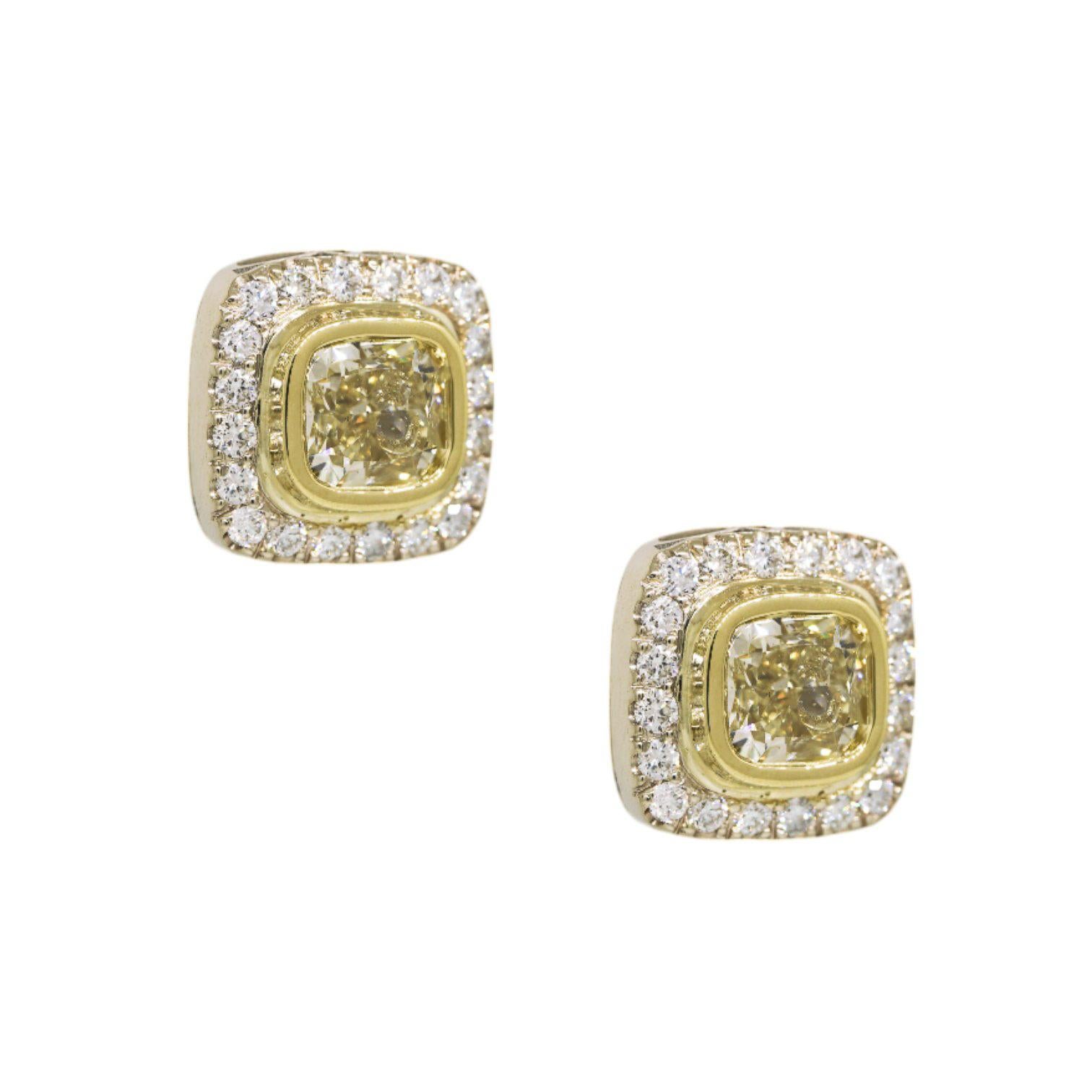 Natural Fancy Yellow Cushion Cut Diamond Halo 18 Karat Earrings In Stock In Excellent Condition For Sale In Boca Raton, FL