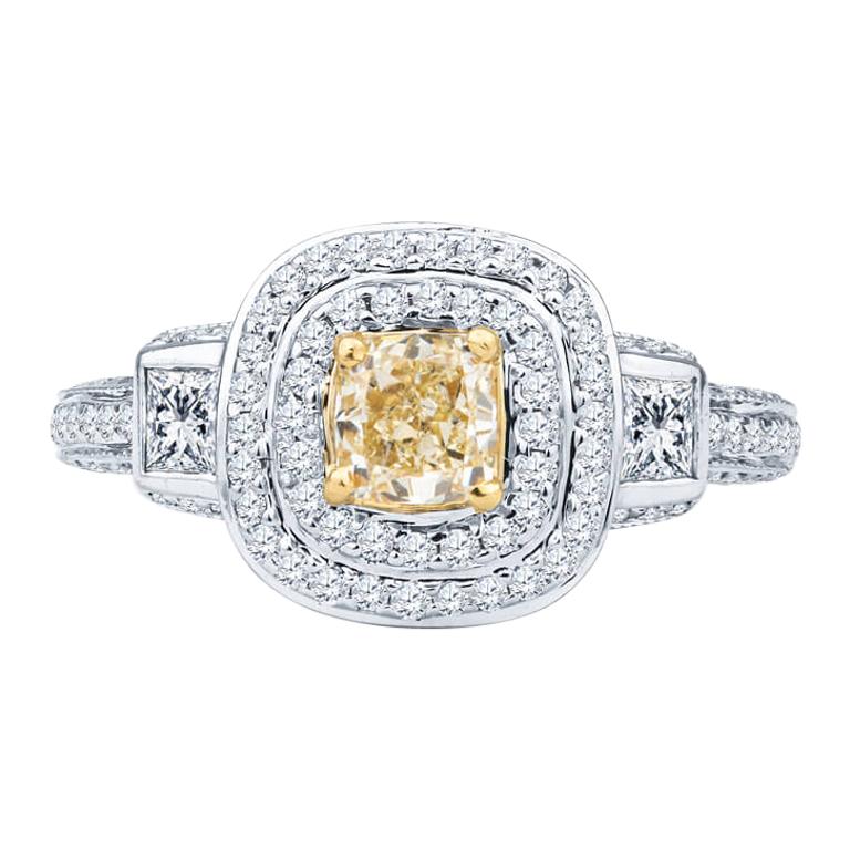 Fancy Yellow Cushion Cut Diamond with Two Princess Cut Diamonds & Double Halo For Sale