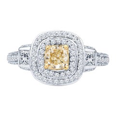 Fancy Yellow Cushion Cut Diamond with Two Princess Cut Diamonds & Double Halo