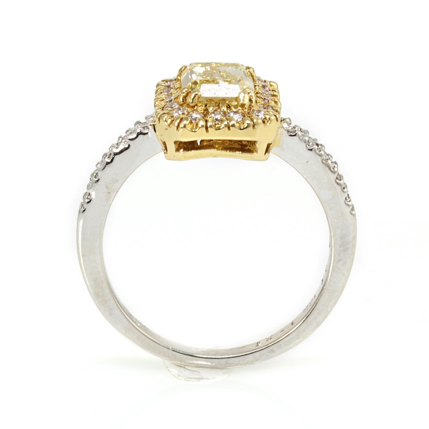 Fancy Yellow Cushion Cut Halo Set Diamond Engagement Ring

This ring is handcrafted with a fancy yellow radiant cut diamond in a halo setting. Flanked by white diamonds on the shank this ring looks bigger than what it may seem. Center diamond is a