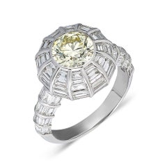 Fancy Yellow Diamond and Baguette Diamond 4.32ct. Ring in 18K White Gold