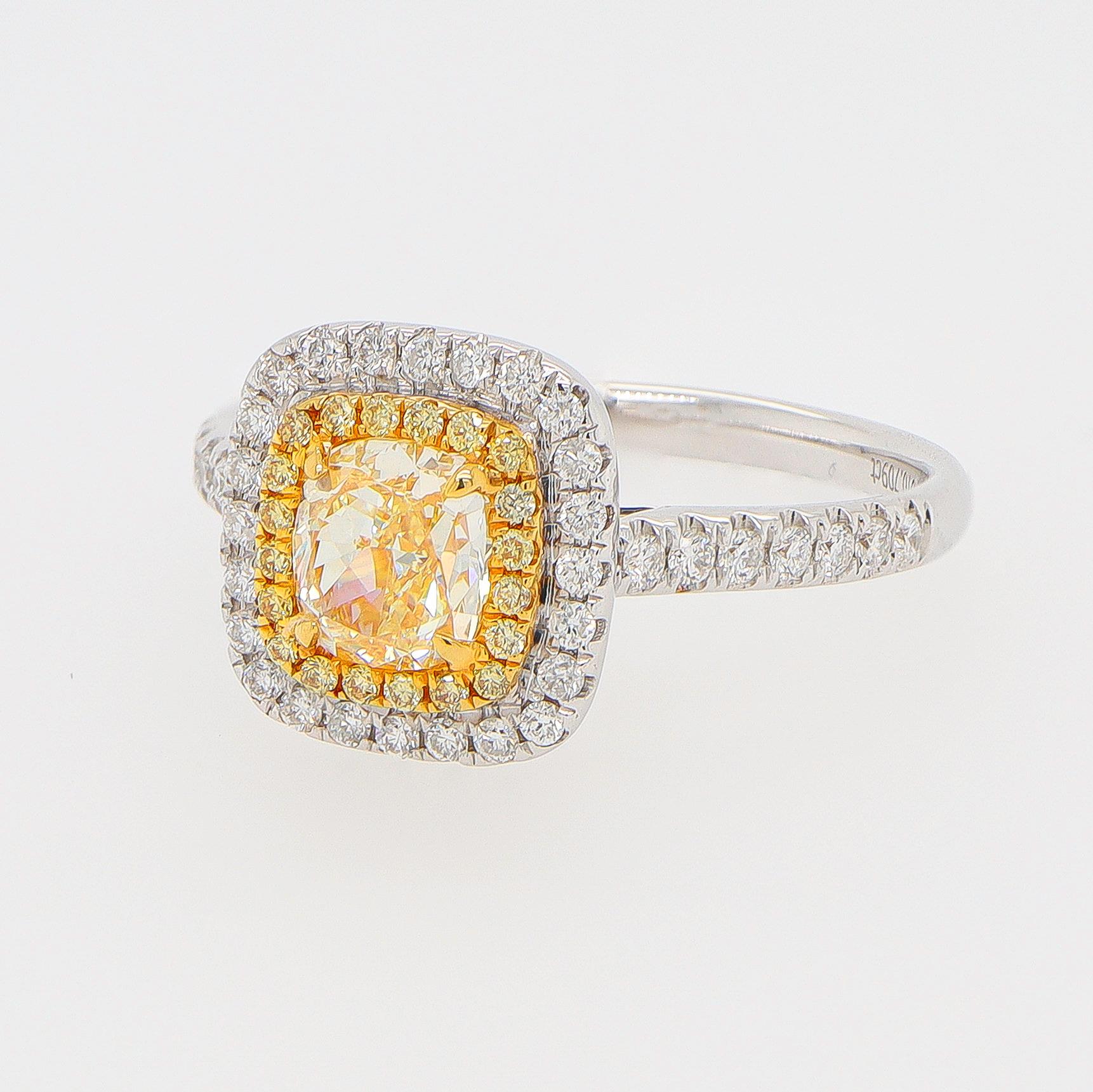 Fancy Colored Yellow Diamond Ring Set With Yellow Diamond Halo and White Diamond Halo. It comes with an appraisal by GIA G.G.
This contemporary ring is checking all the boxes.
Beautiful Clean Design With Fancy Yellow Diamond
Main Fancy Yellow