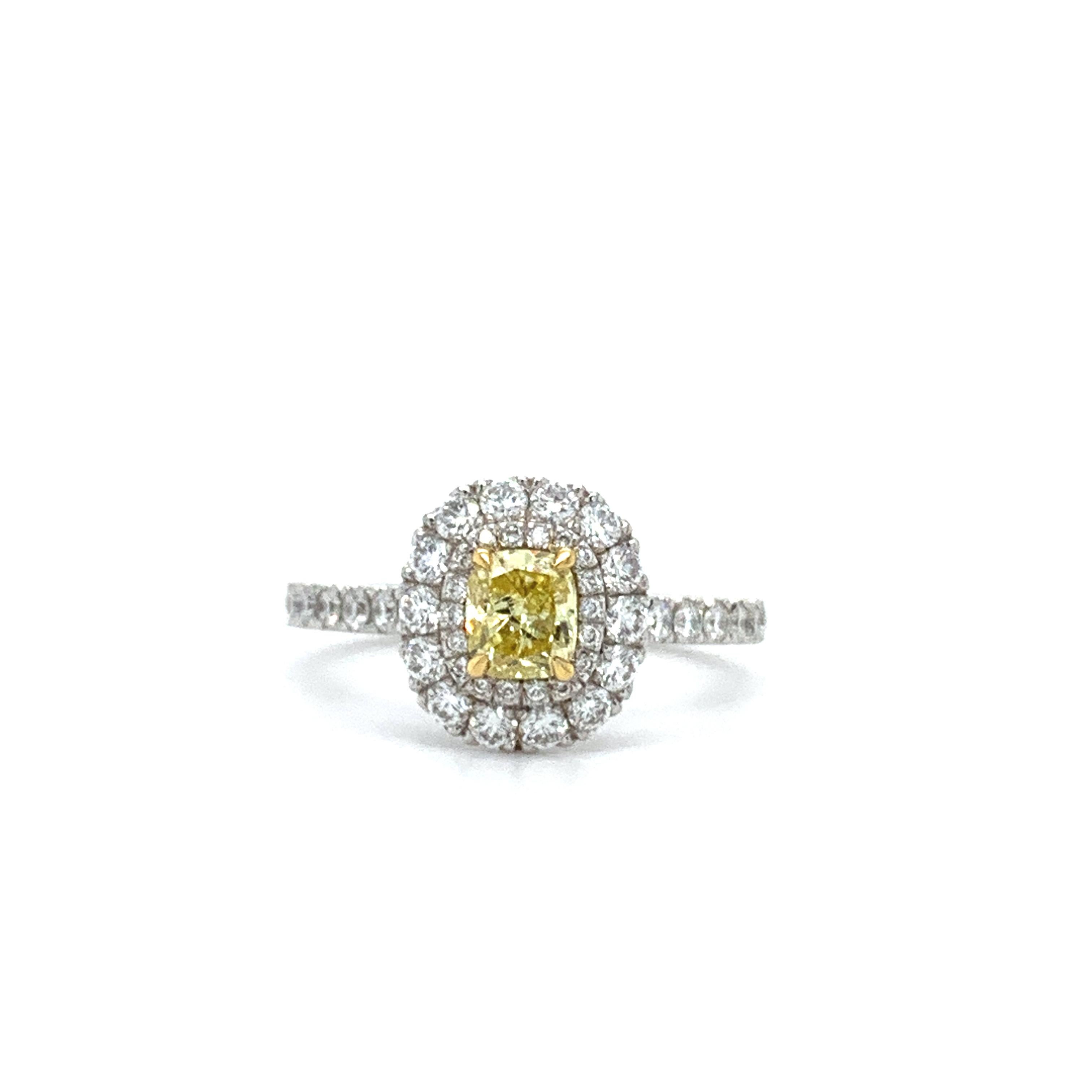 Fancy yellow diamond double halo engagement ring in platinum
Composed of of one solitaire fancy yellow diamond cushion cut total weighing 0.50ct accented by round brilliant diamond total weighing 0.75ct F colour VS1 clarity double halo engagement
