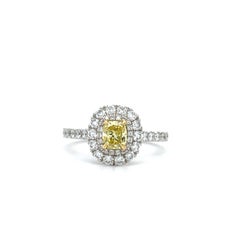 Fancy yellow diamond double halo engagement ring 18ct white gold