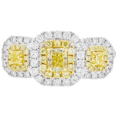 Fancy Yellow Diamond Double Halo Two-Color Gold Three-Stone Ring