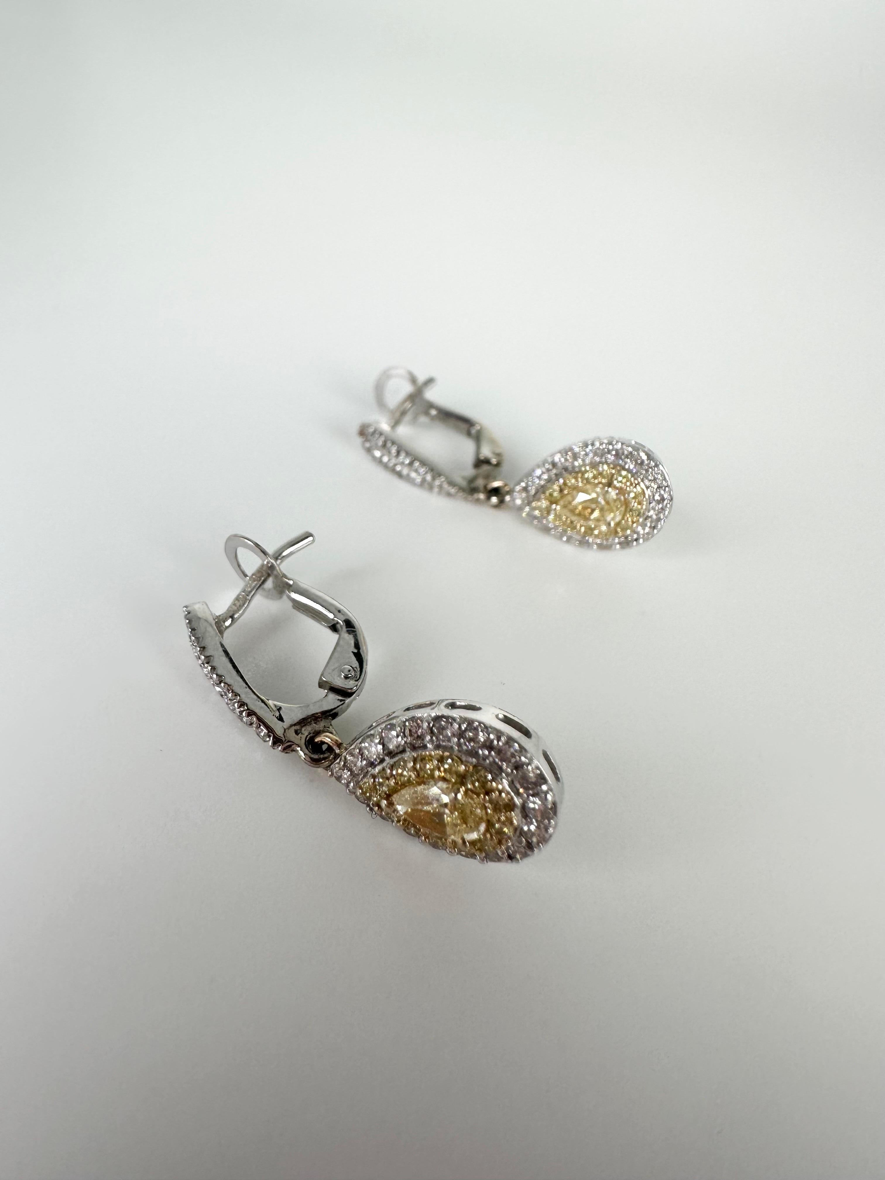 Pear Cut Fancy yellow diamond earrings 18KT 1.20ct diamond pear earrings For Sale