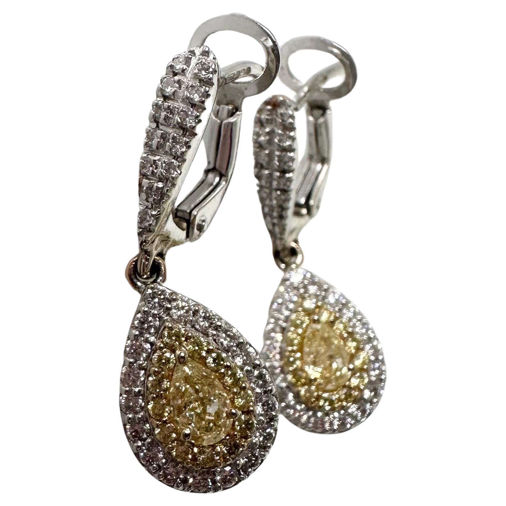 Fancy yellow diamond earrings 18KT 1.20ct diamond pear earrings For Sale