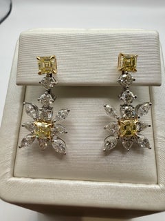 Fancy yellow diamond earrings 18KT gold cocktail earrings