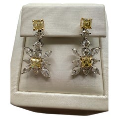 Fancy yellow diamond earrings 18KT gold cocktail earrings