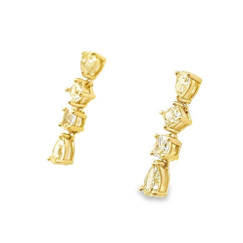 Indulge in the luxurious beauty of these drop-down earrings. They feature an exquisite arrangement of fancy yellow mixed-shape diamonds, weighing a total of 2.27 carats. The diamonds are expertly crafted to create a mesmerizing and modern design