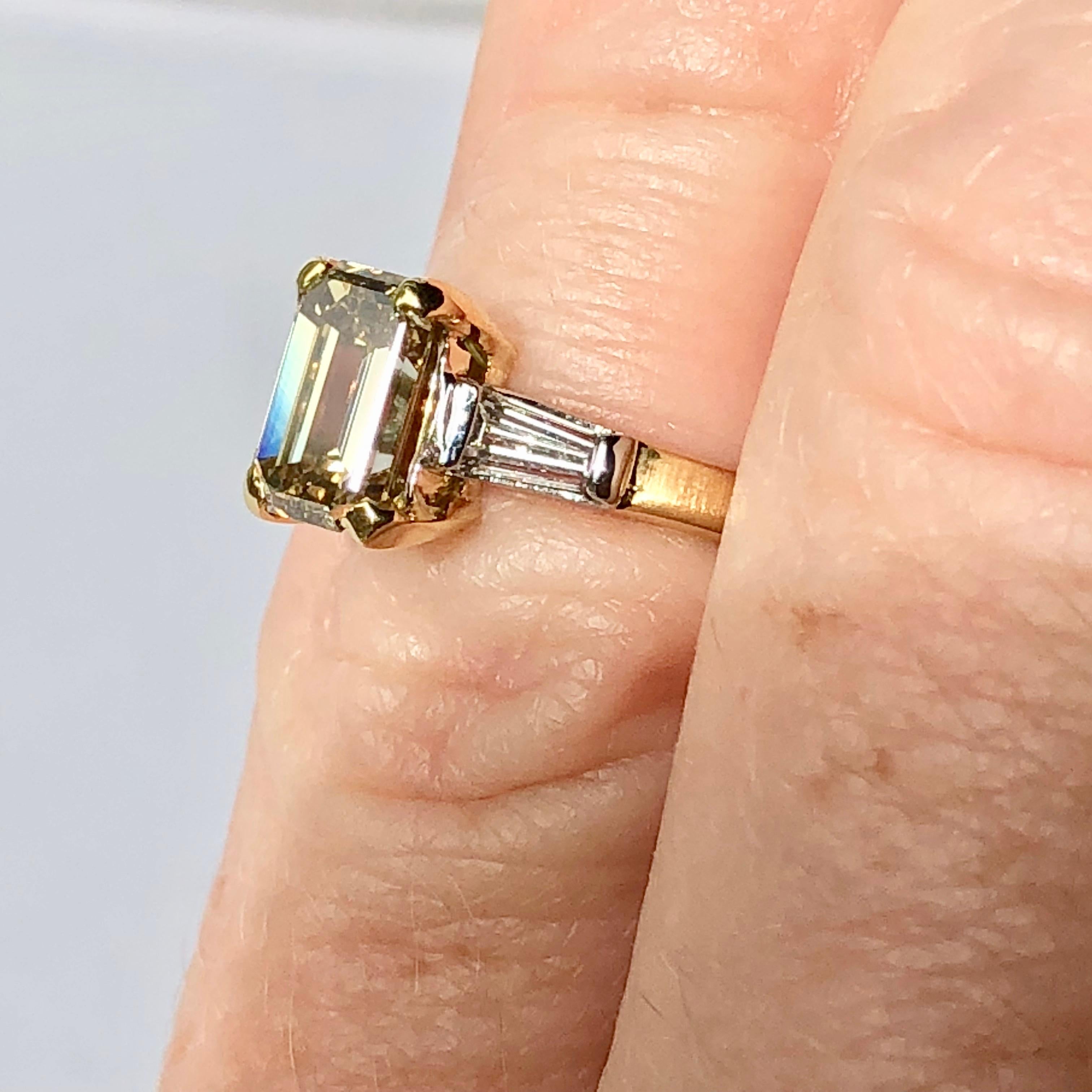 Contemporary Fancy Yellow Diamond Emerald Cut 1.01 Baguette Shoulder Engagement Ring 18k Gold For Sale