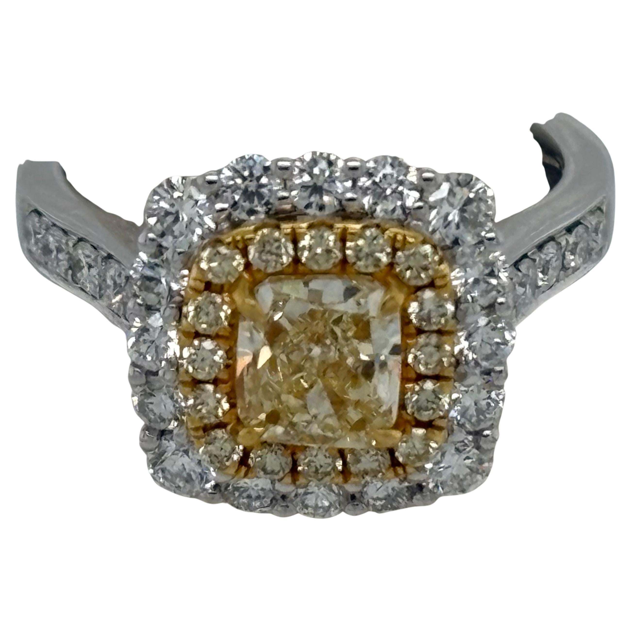 Fancy Yellow Engagement or Cocktail Ring, Diamond, 18KT White Gold, 

Elegant cocktail or engagement ring featuring a central Fancy Yellow Diamond measuring approximately 6.39 mm square by 6.00 mm deep. The center stone (appx 0.65ct) is accented by