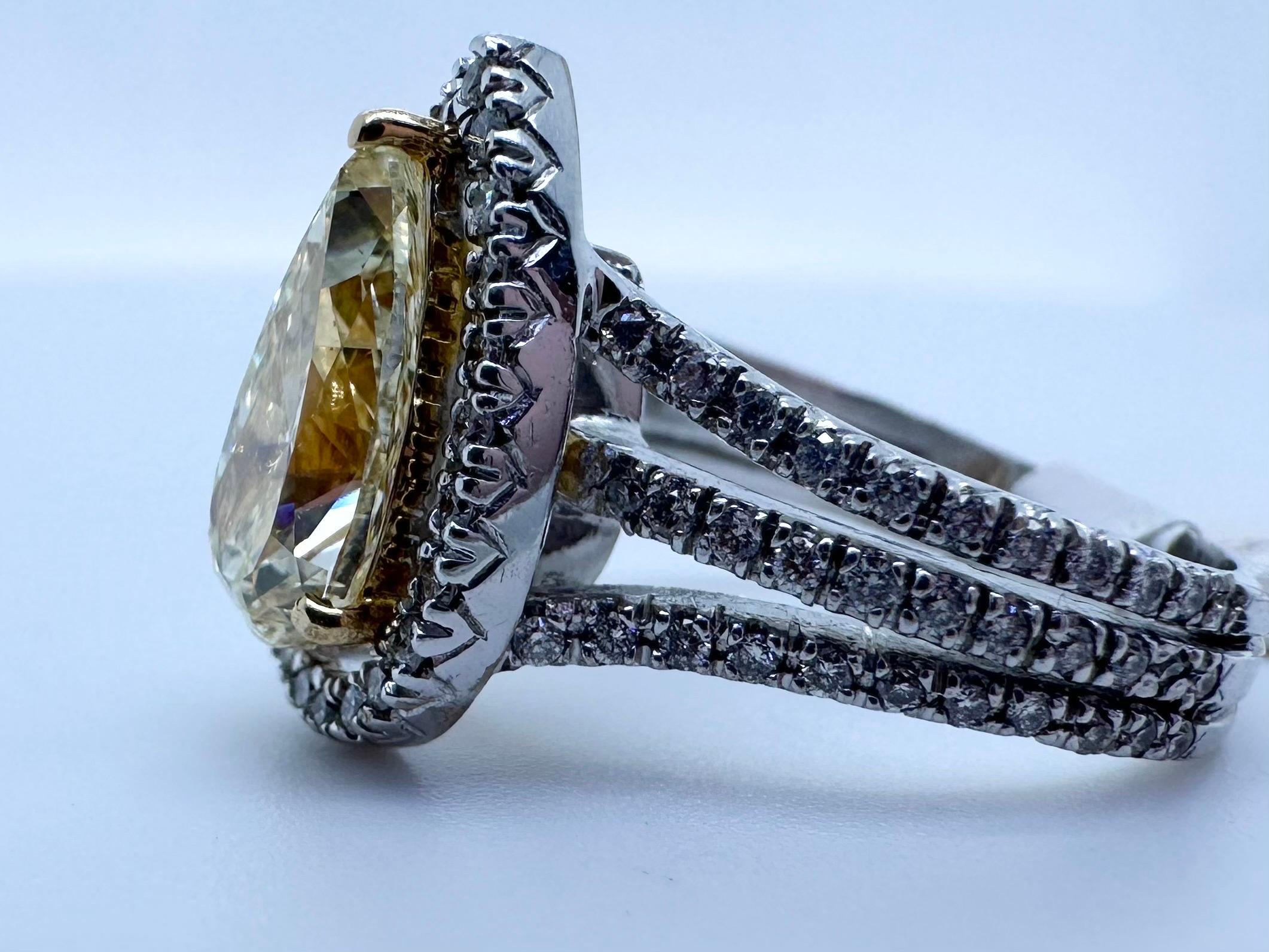 Fancy Yellow diamond halo ring 18KT white gold  In New Condition For Sale In Boca Raton, FL