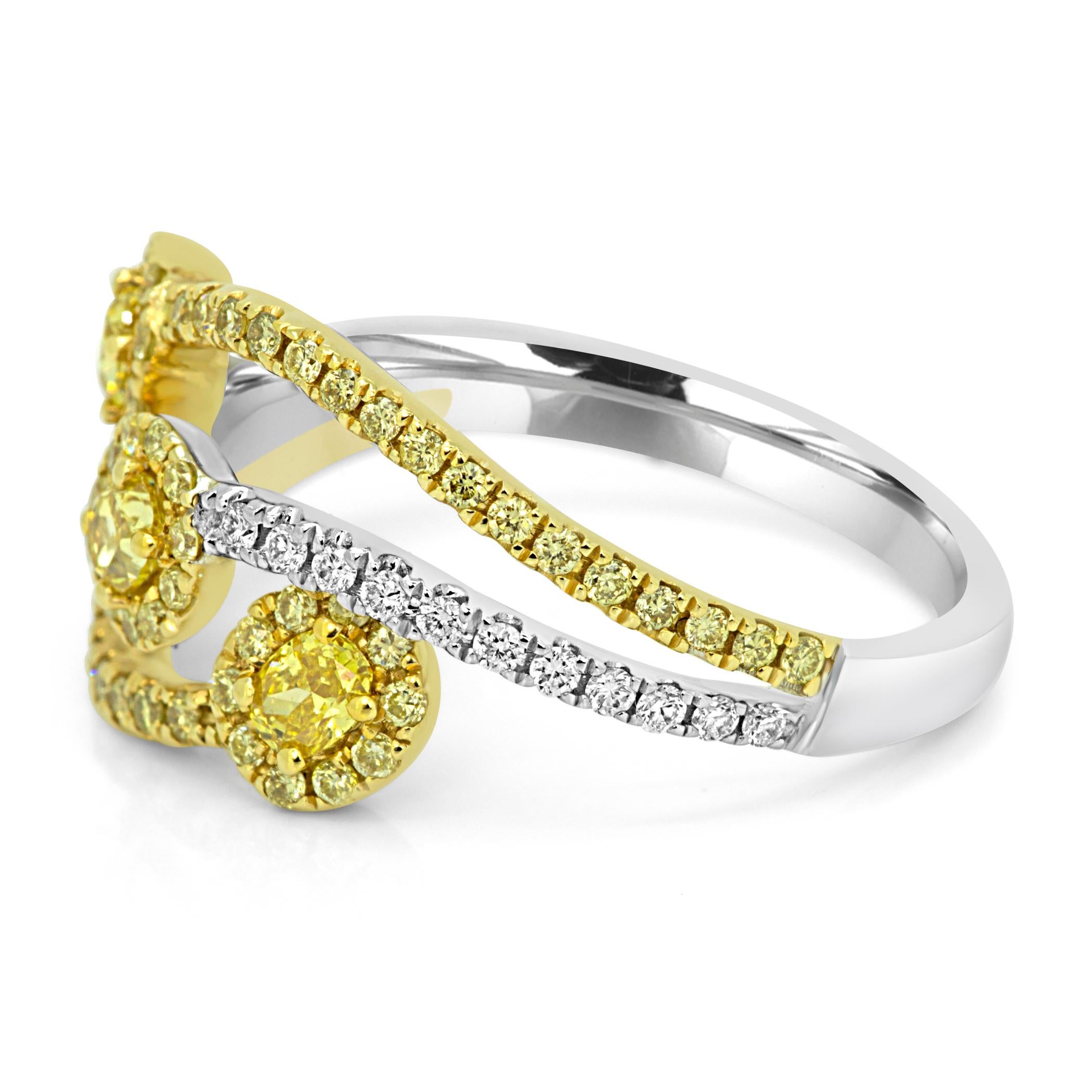 3 Natural Fancy Vivid Yellow Oval Diamond 0.32 Carat Encircled in single Halo of Natural Fancy Yellow Round Diamond 0.32 Carat and Natural White Diamond on the Sides 0.13 Carat in 14K White and Yellow Gold Stunning Fashion Cocktail Ring.

Total