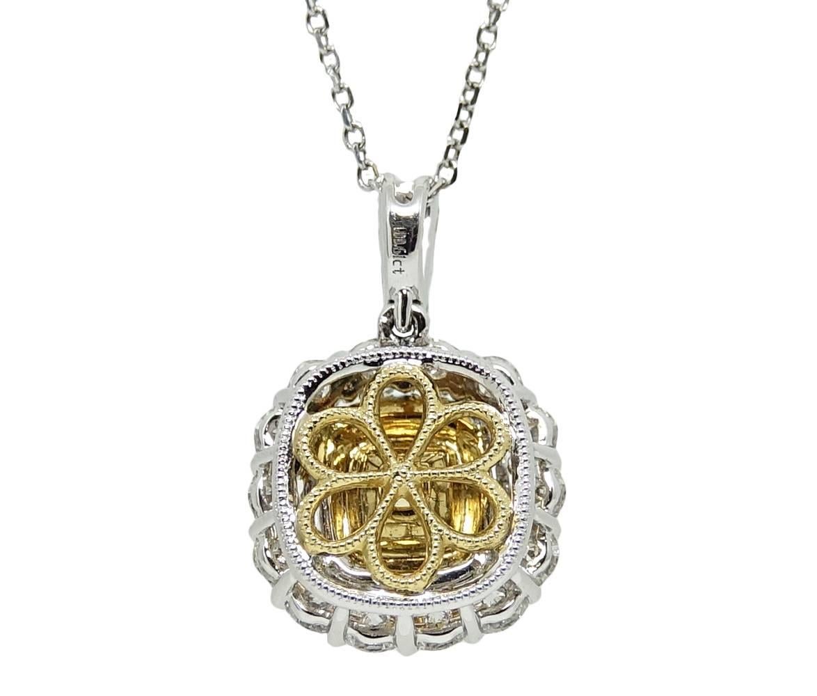 This Gorgeous 18K White Gold Pendant Necklace Has A Fancy Yellow Diamond Weighing A Total Carat Weight Of 0.61 Carats, With An SI1 Clarity. White Diamonds Surround The Center Yellow Diamond Weighing A Total Carat Weight Of 1.42 Carats.
GIA Report: