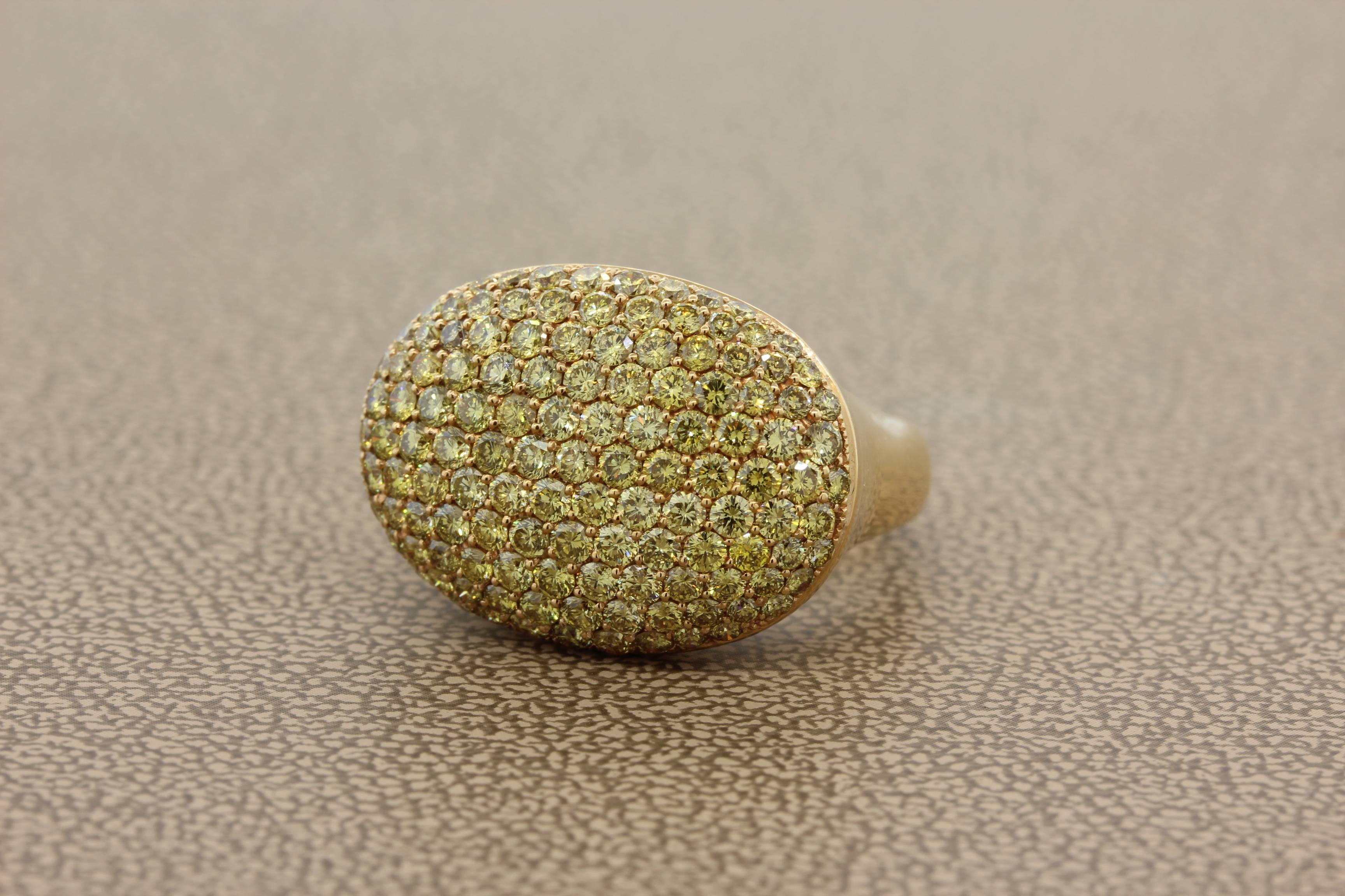A lovely dome ring in a modern design featuring 2.80 carats of fancy yellow round diamonds. Set in 18k yellow gold once worn you will not want to take it off.
Size 6 ¾ 
