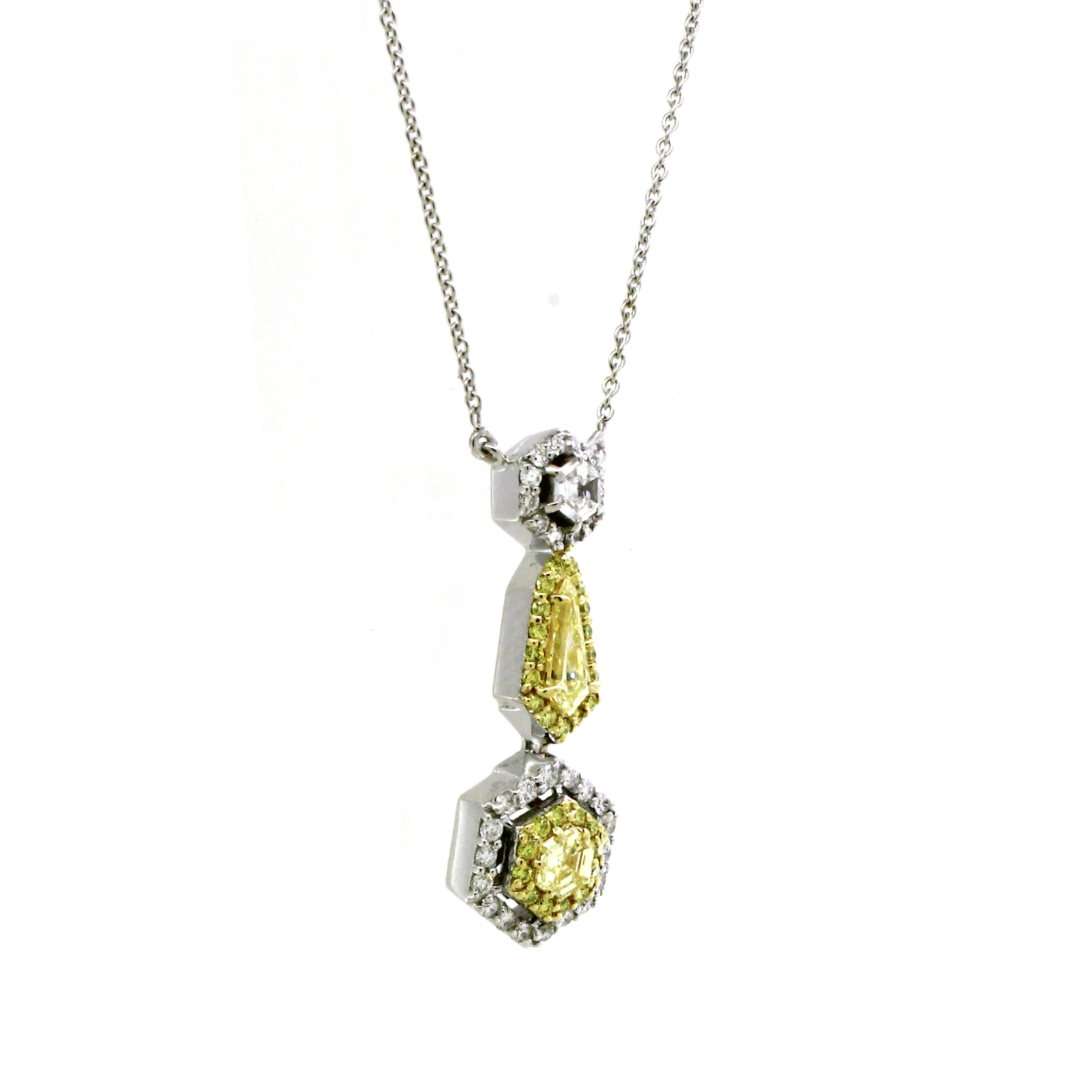 Behold the epitome of luxury and elegance in our extraordinary pendant chain, a dazzling masterpiece that combines the enchanting beauty of fancy yellow diamonds with the timeless allure of white diamonds.
At the center of this pendant, you'll find