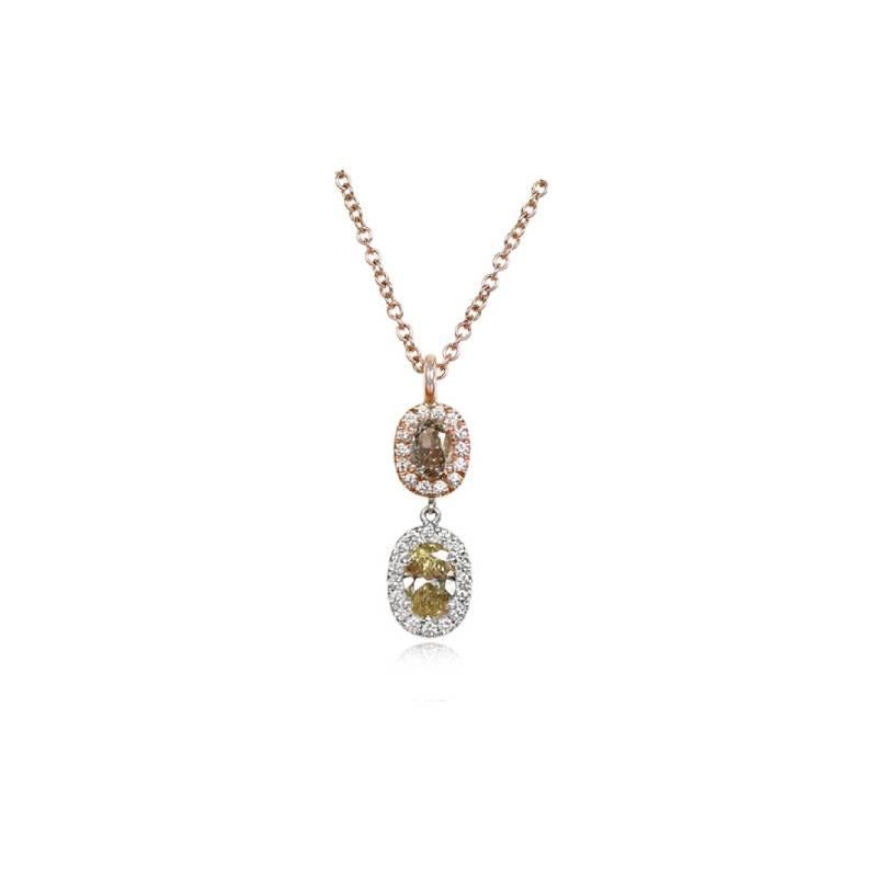 Dazzling Harmony: 0.48 Carat Oval-Cut Diamond and 0.71 Carat Fancy Yellow Diamond Pendant in 18k White and Rose Gold. Adorned with a captivating design, this pendant showcases two exquisite oval-cut diamonds, skillfully set in prongs. The first